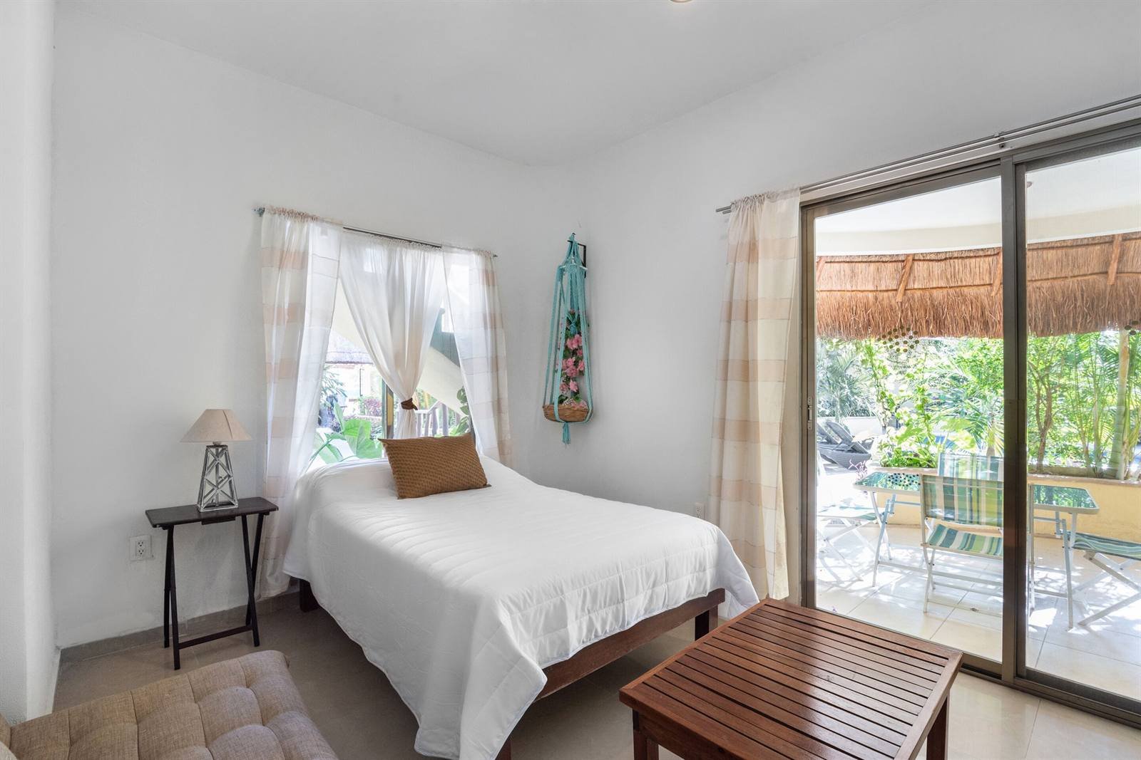 Villas Akalan: bedroom opening onto a private patio